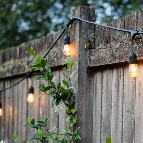 11 stylish solar fence lights to brighten your garden space.